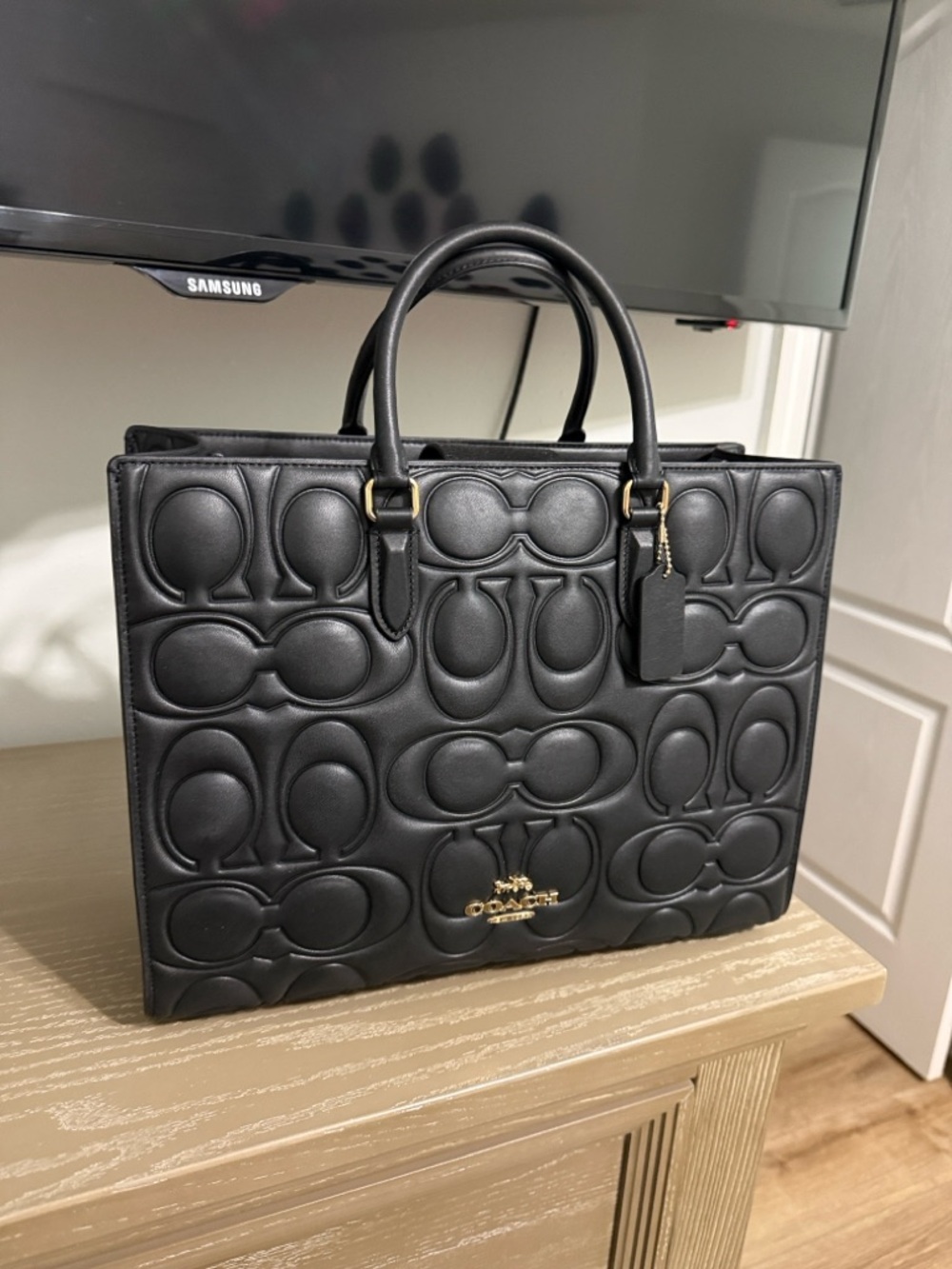 Coach Black Quilted Signature Leather Tote with Gold Hardware